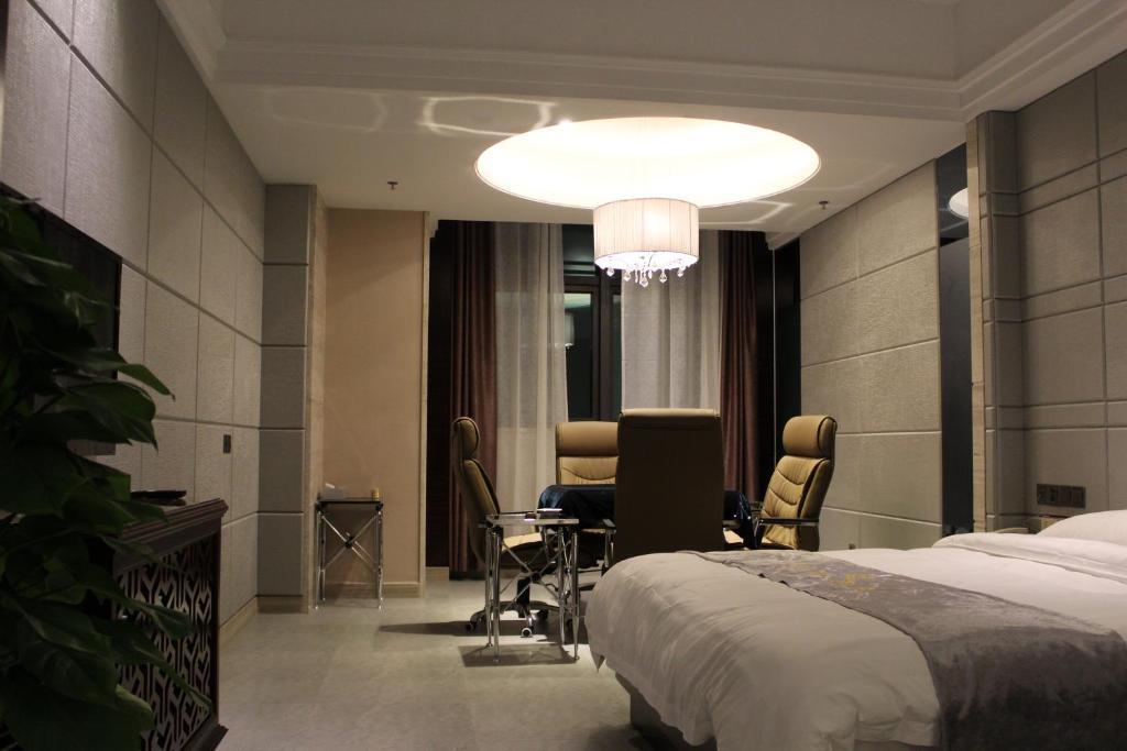 Junfu Hotel Cantón Habitación foto