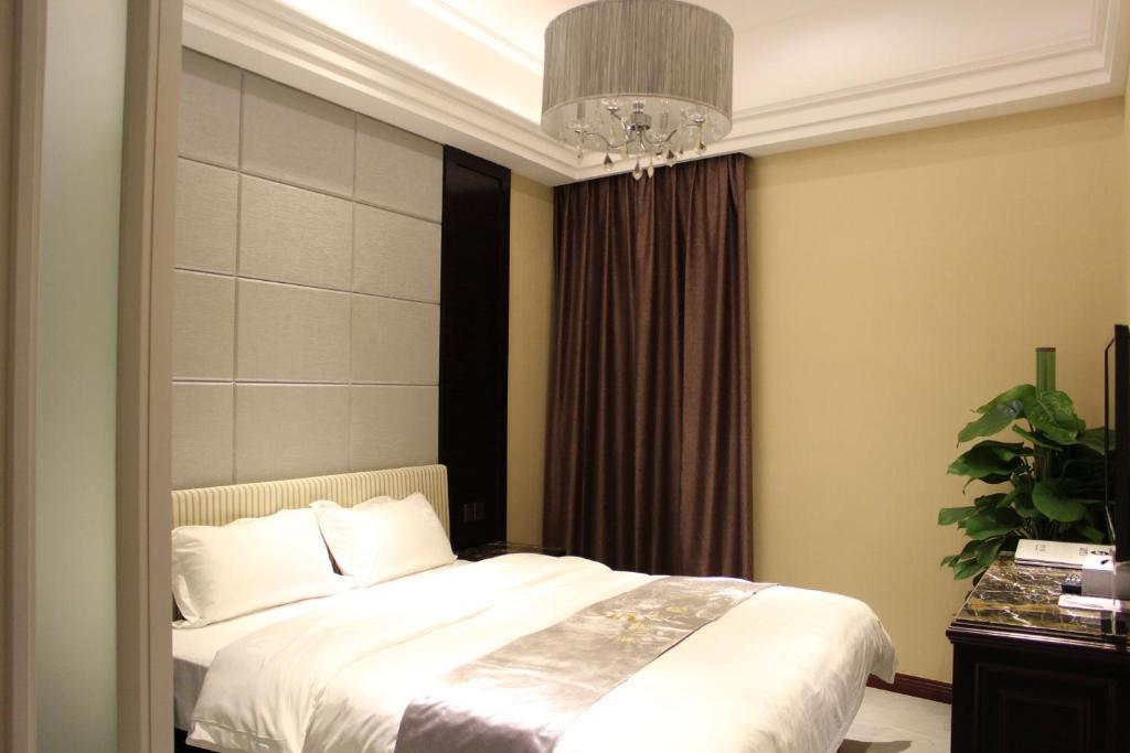 Junfu Hotel Cantón Habitación foto